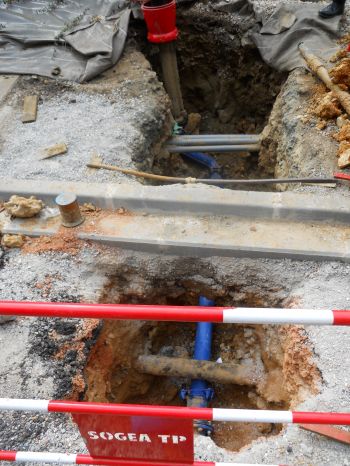 Quel taux de TVA s'applique à la partie privative des travaux de raccordement d'une habitation au réseau public d'eau potable?